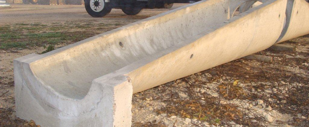 Concrete drainage pipe Angled concrete drainage culvert. Road culvert at LeRoy Schroeder