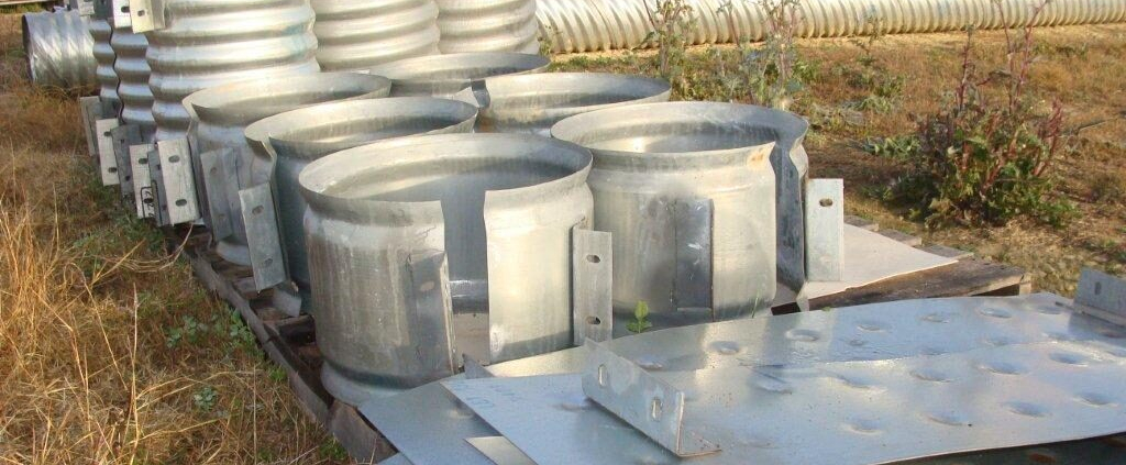 Culvert fittings Currugated metal culvert fittings at LeRoy Schroeder stone yard, Brenham.
